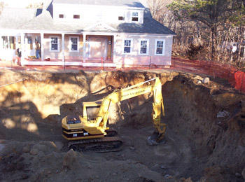 Dalpe Excavation digging a house foundation in Falmouth Cape Cod