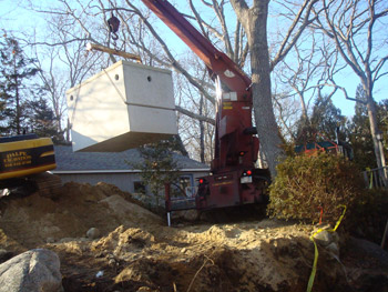 Dalpe Excavation placing a new septic tank in Falmouth Cape Cod